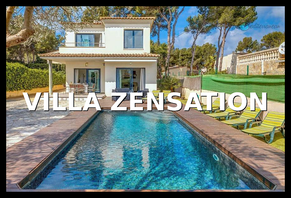 A modern villa with a swimming pool and outdoor seating area.