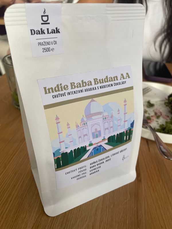 A coffee bag featuring Czech hipster coffee from India with a colorful design.