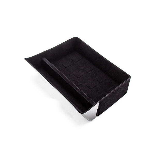 A black organizational accessory designed for a Tesla vehicle.