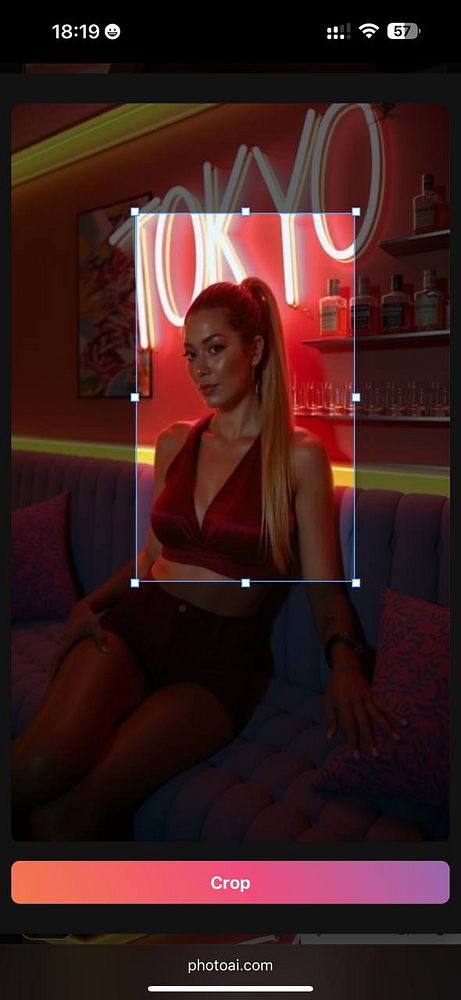 A mobile crop editor interface displaying a woman in a stylish setting with a highlighted crop area.