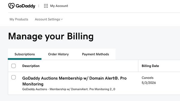 The image displays a billing management interface from GoDaddy, showing a subscription for GoDaddy Auctions membership.
