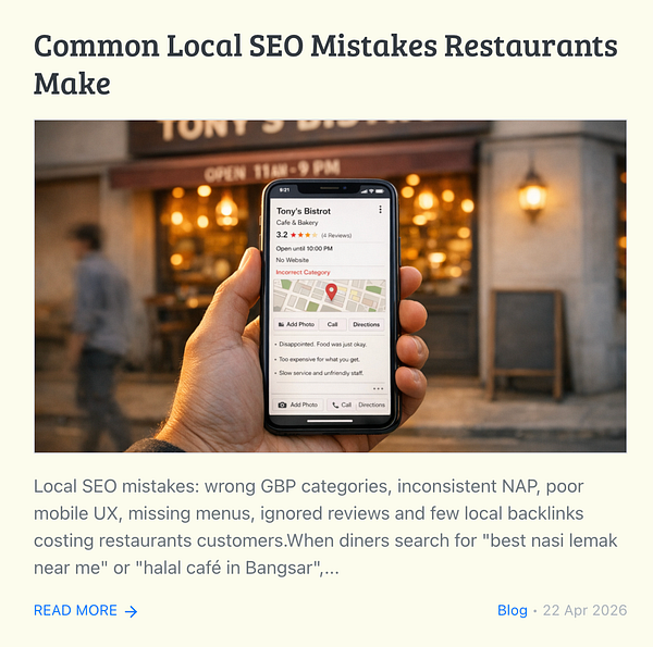 A man using a laptop outdoors while a child plays nearby with a red toy in a park setting.