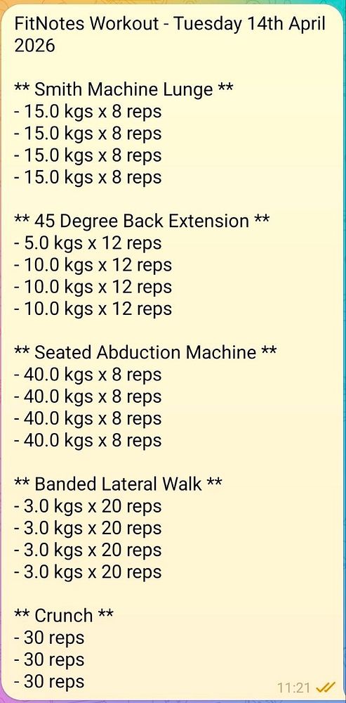 A person performing a barbell overhead press exercise in a gym setting is shown in the image.