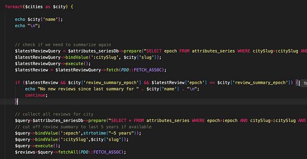 The image displays a code snippet written in PHP that processes city reviews.