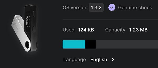 The image displays the interface of a Ledger Nano S hardware wallet with system information.