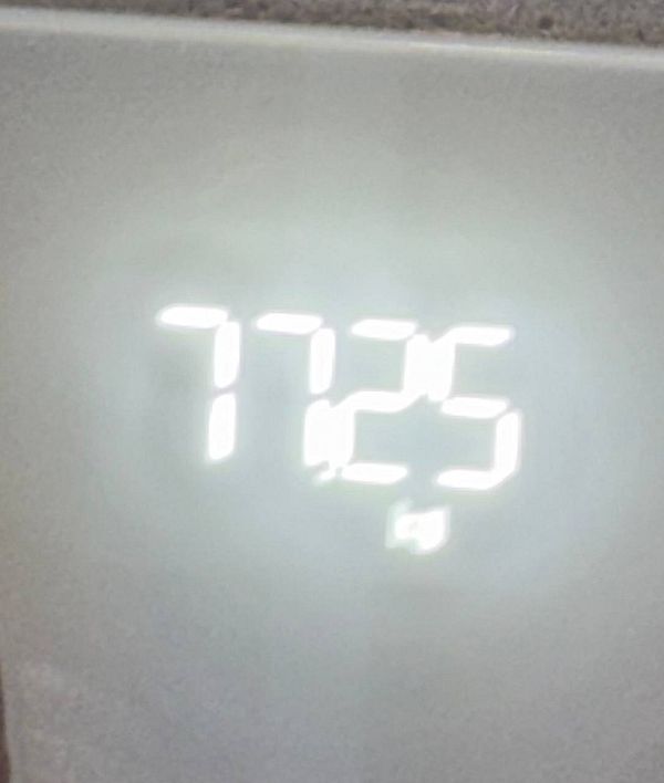 The image displays a digital weight measurement.