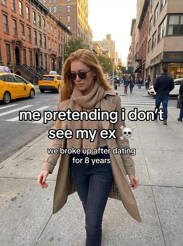 A woman walks down a city street, dressed in a stylish outfit, while text overlays express her feelings about encountering an ex.