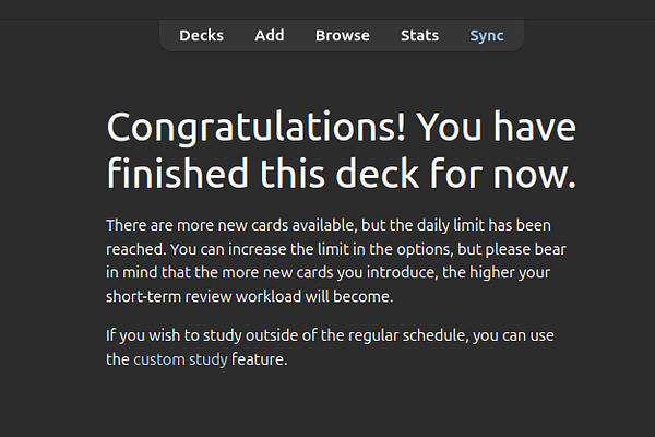 A modern kitchen interior with a breakfast table, chairs, and various kitchen fixtures in daylight.