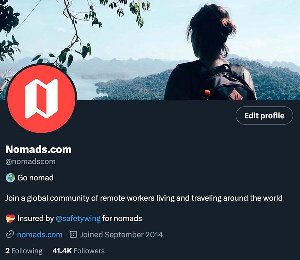 The image features a social media profile for Nomads.com, showcasing a scenic background and a user looking out over a landscape.