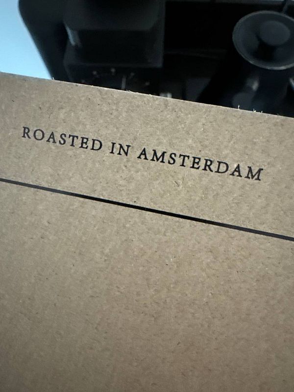 A close-up of a coffee packaging label indicating its origin.