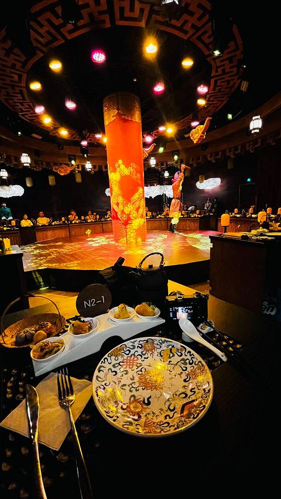 A promotional poster for the Xuyan Immersive Dining Show with bold colorful text and graphics.