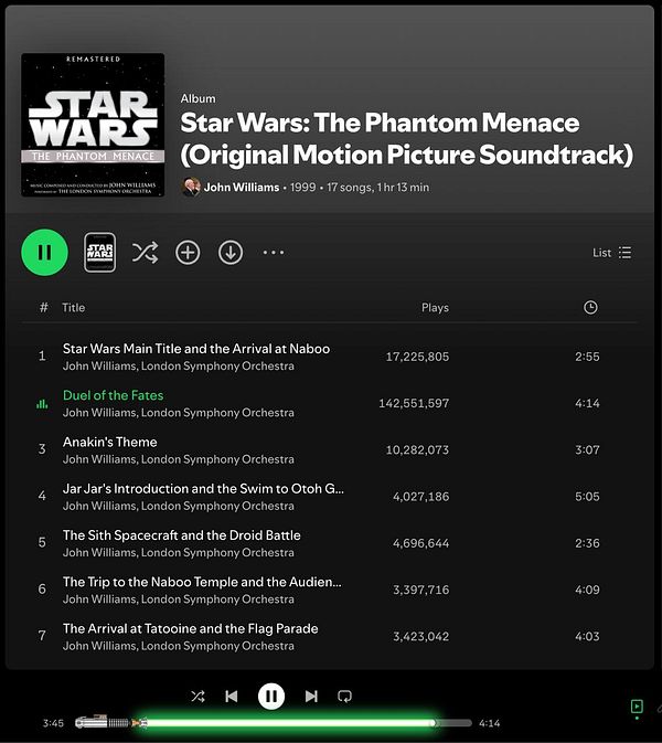 The image displays a Spotify interface featuring the album 'Star Wars: The Phantom Menace' with a lightsaber-themed playback control.