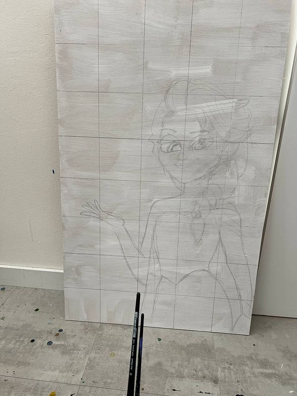 A blank canvas with a light pencil sketch of a character is set up for acrylic painting.