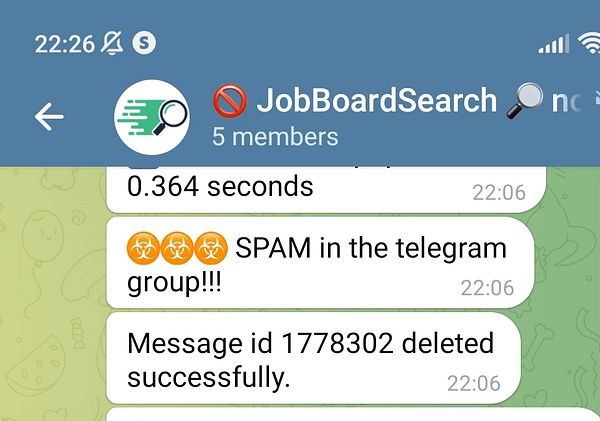 A Telegram group chat displaying an antispam bot in action.