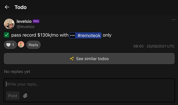 A task interface showing a completed goal related to monthly revenue.