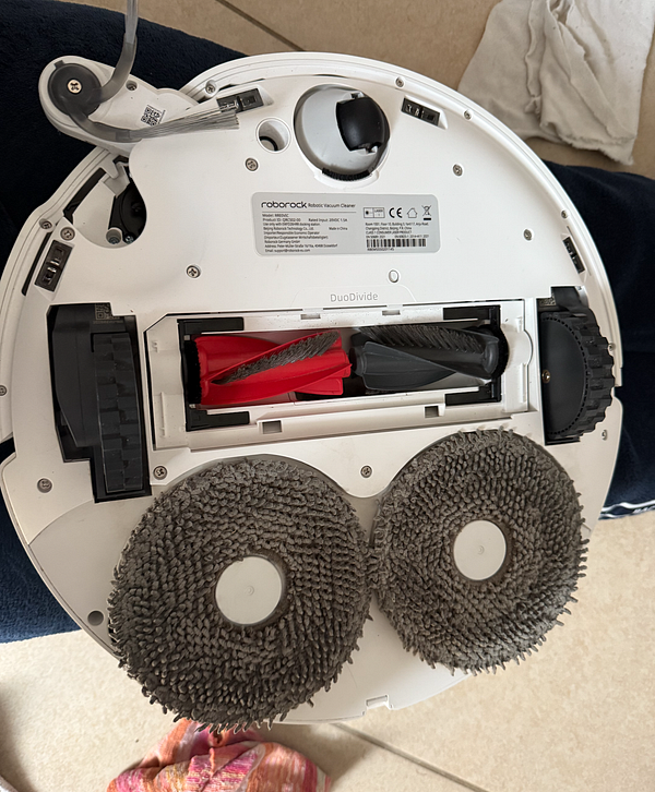 An image showcasing two models of a life-cleaning robot, including a new one capable of cleaning stairs.