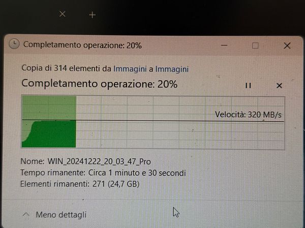 Close-up of a USB-C adapter connected to a thick 1TB external SSD drive on a dark surface, highlighting hardware attachment for data transfer issues.