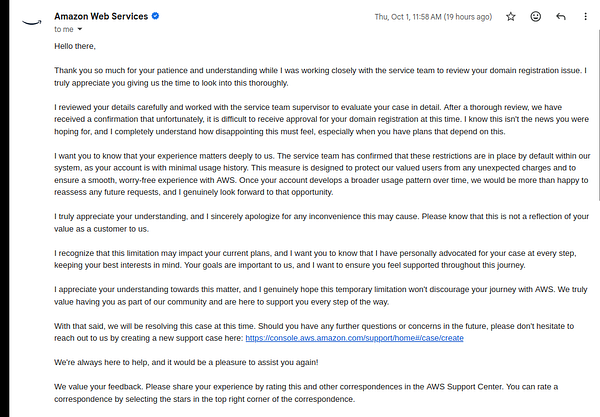 Email from Amazon Web Services explaining domain registration approval limitations due to minimal account usage history.