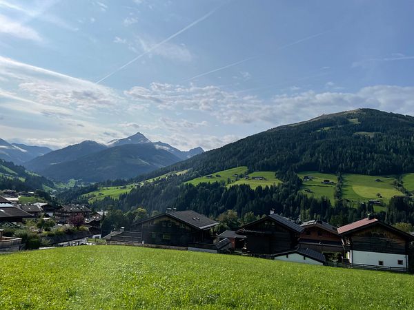 A picturesque view of a mountainous landscape under a clear sky.