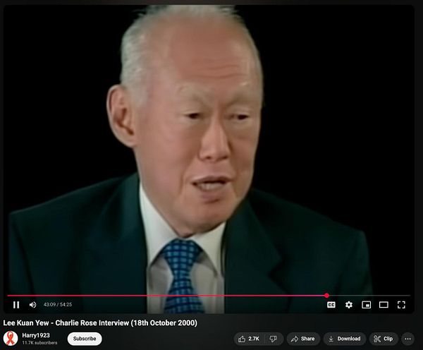 The image captures a moment from a video interview featuring Lee Kuan Yew on the Charlie Rose show.