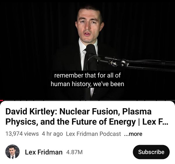 A man speaks into a microphone during a podcast episode about nuclear fusion energy.