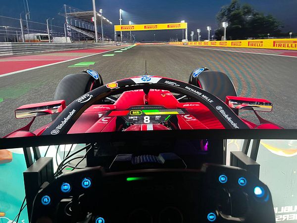 Screenshot of the F1 24 racing game showing a player's car navigating a circuit with game UI visible.