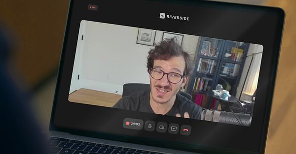 A person is engaged in a video recording session using the Riverside platform.