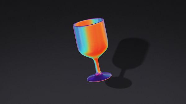 A colorful, translucent wine glass is displayed against a dark background.
