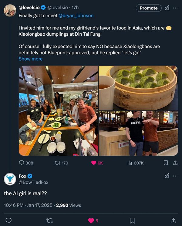 A group of friends enjoying a meal at a restaurant, featuring Xiaolongbao dumplings.