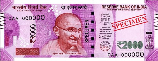 A specimen of a 2000 Indian Rupee note featuring Mahatma Gandhi.