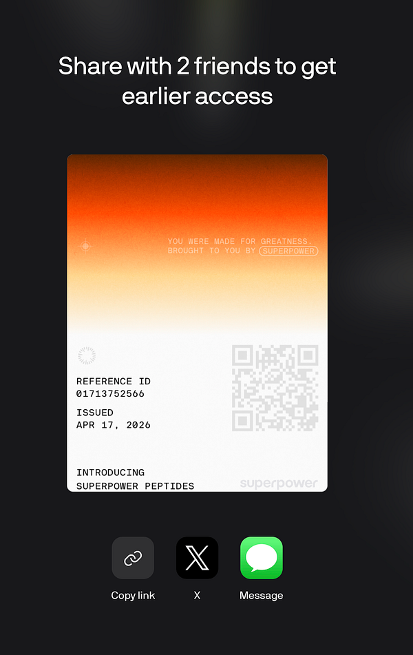 Portrait of a smiling young man with curly hair and facial hair in a bright home interior.