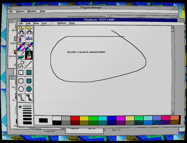 Screenshot of a Windows 3.11 file manager window displaying folder contents, including a Shared folder to be added on a network computer.