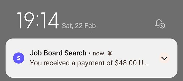 A smartphone notification displaying a payment received from Job Board Search.