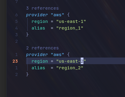Screenshot of a text editor displaying Terraform code configuring two AWS regions.