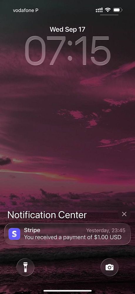 The image displays a smartphone lock screen featuring a notification from Stripe about a payment received.
