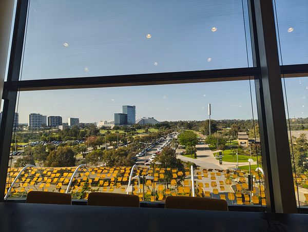 A view from a window overlooking Burswood Stadium and the surrounding area.