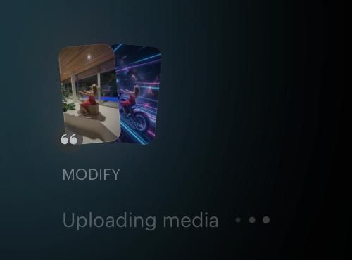 A grayscale photograph of two people dancing, captured with a long exposure effect creating light trails around them.