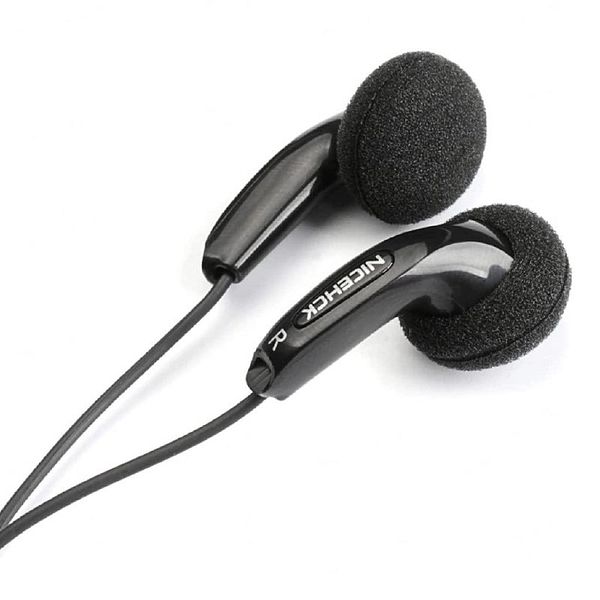 Photo of NiceHCK Traceless earbuds against a dark background.