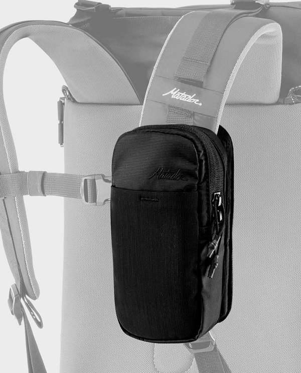 A Matador Speed Stash is prominently displayed attached to a backpack strap.