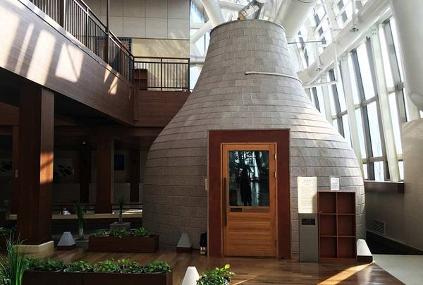 A modern spa facility featuring a unique stone structure.