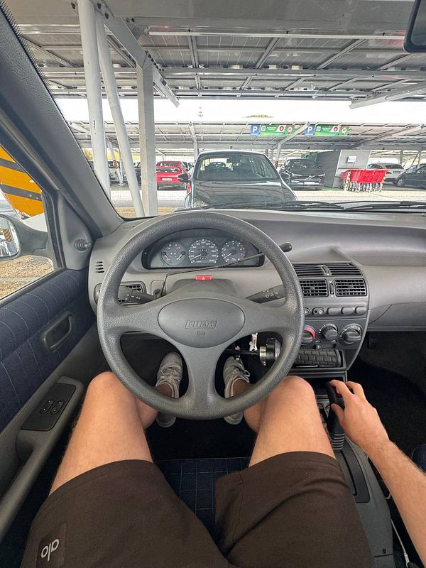 A first-time driving class perspective from inside a car.