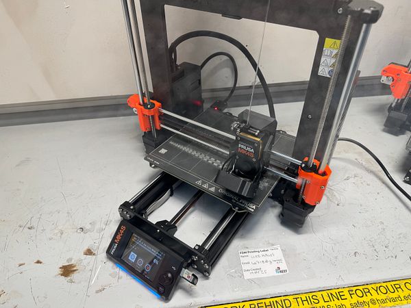 A 3D printer is set up and ready to start printing a model labeled 'tentacles'.
