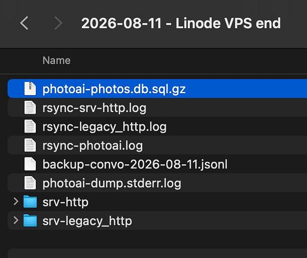 Screenshot of an rsync command running in a terminal transferring the photoai.db file between servers.