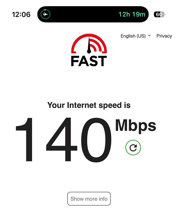 Photograph of an Air France airplane wing and engine during flight over a cloudy sky.