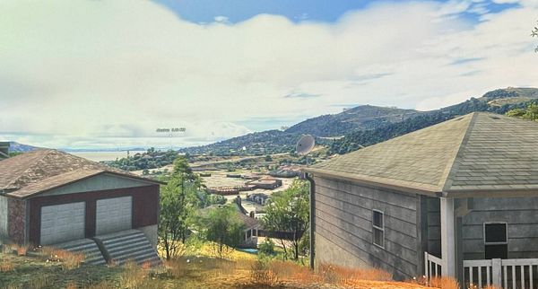 A scenic view of Sausalito with houses and hills in the background.