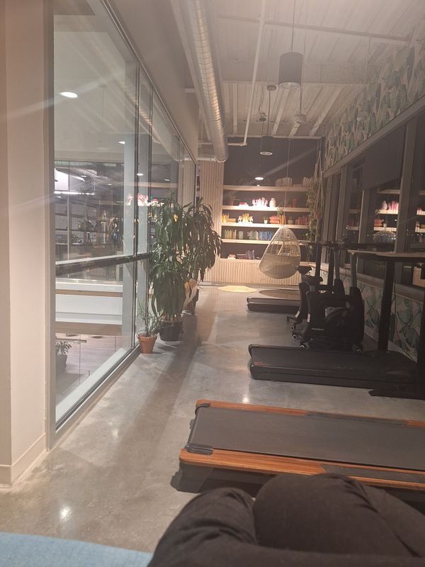 A cozy nook in a modern space designed for relaxation and hiding away from kids.