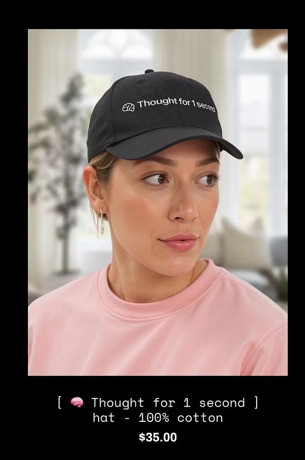 A woman models a black cap with the phrase 'Thought for 1 second' embroidered on it.