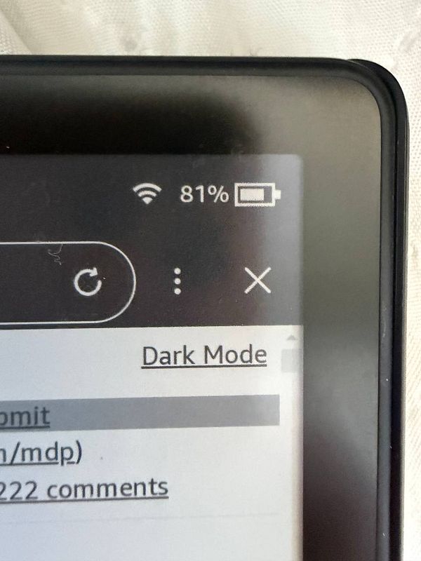 Screenshot of a web proxy interface on a tablet displaying a Kindle website with dark mode settings.