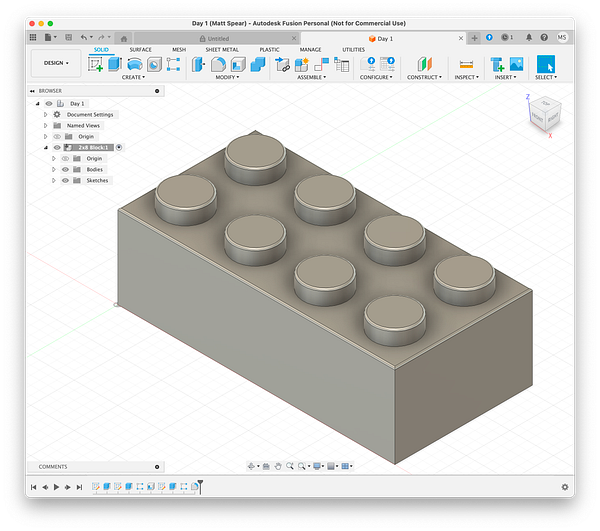 A 3D model of a LEGO-like block created in Autodesk Fusion 360.