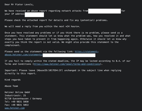 The image displays an email notification regarding an abuse report for network attacks linked to a specific IP address.